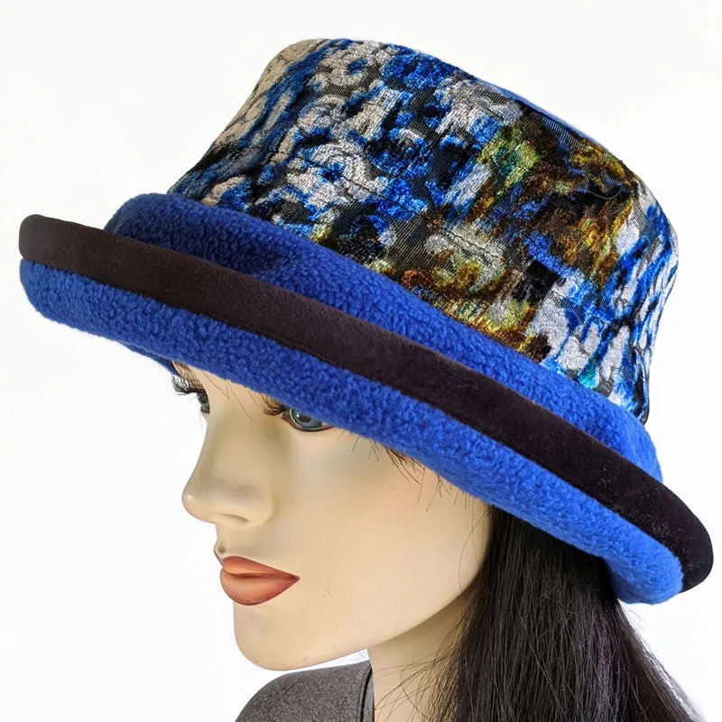 Premium Fashion Hat in royal with floral velvet trim, wide brim and earflap